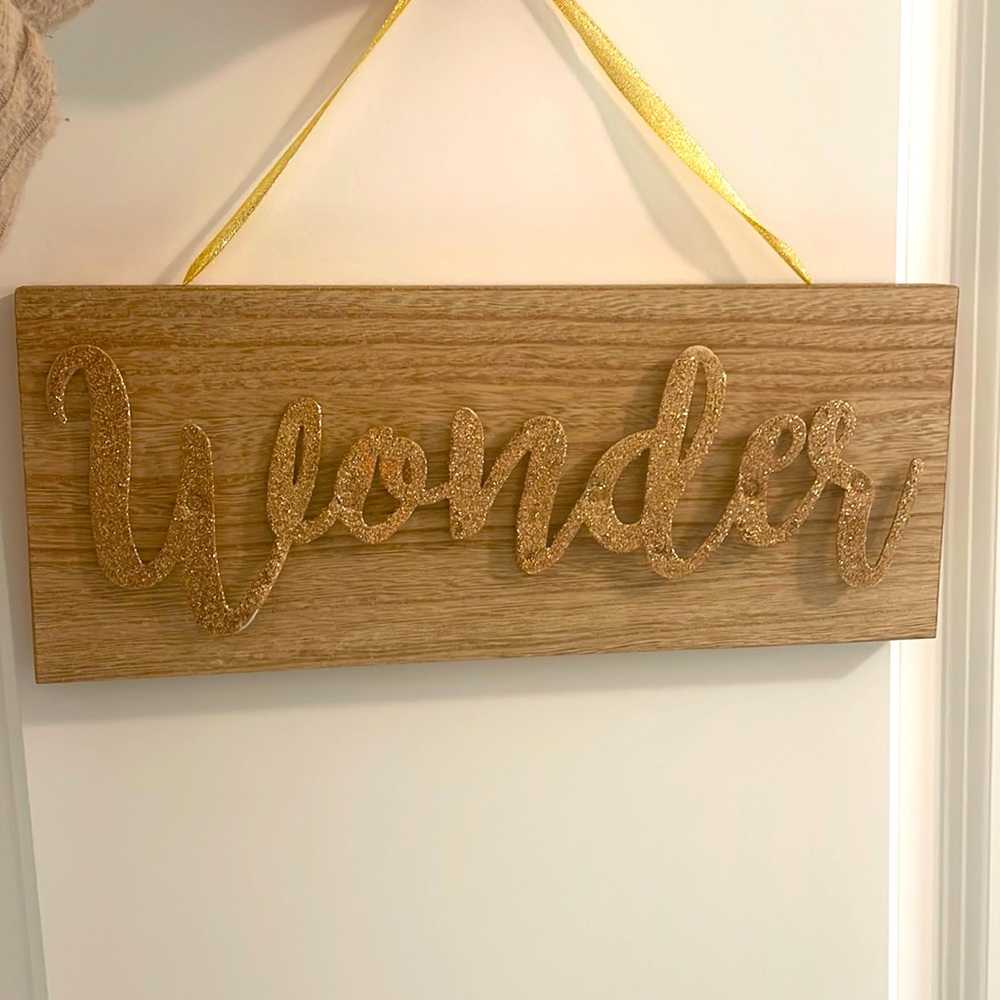 Precious wooden “wonder” hanging sign